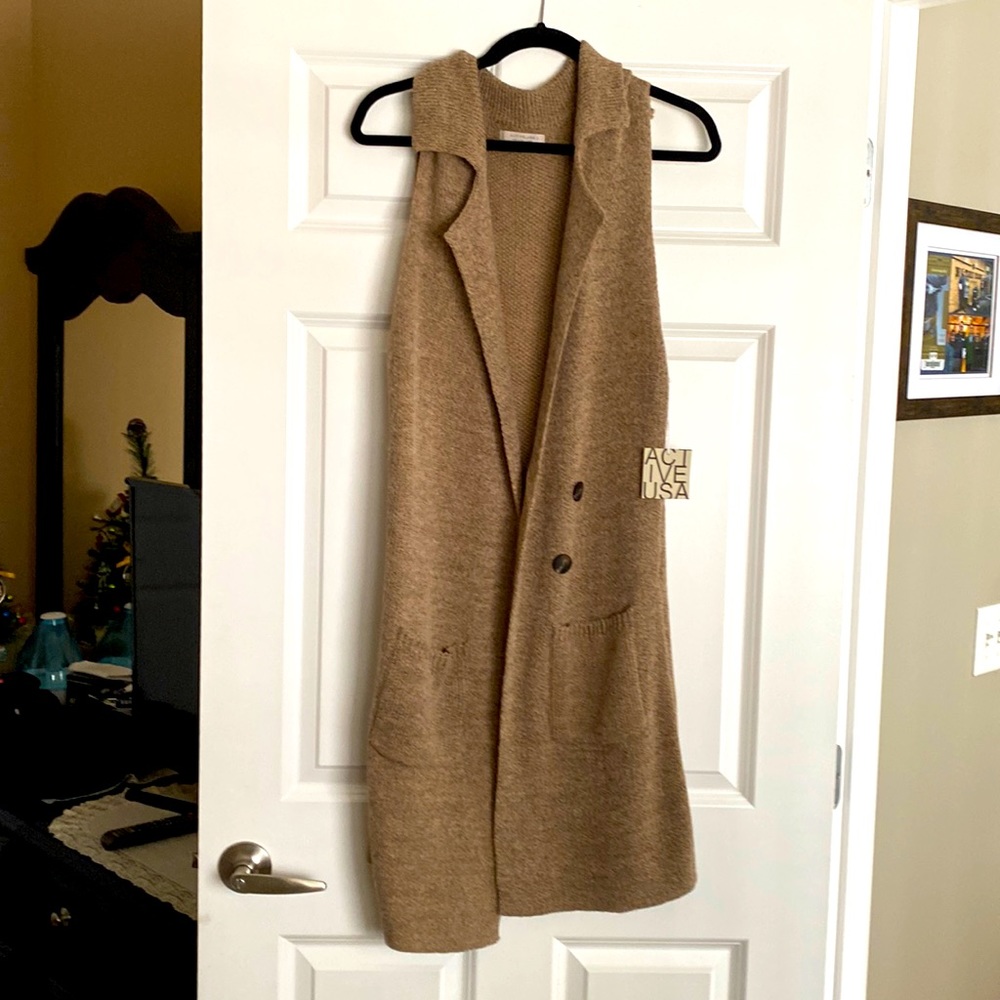 Long brown sleeveless cardigan